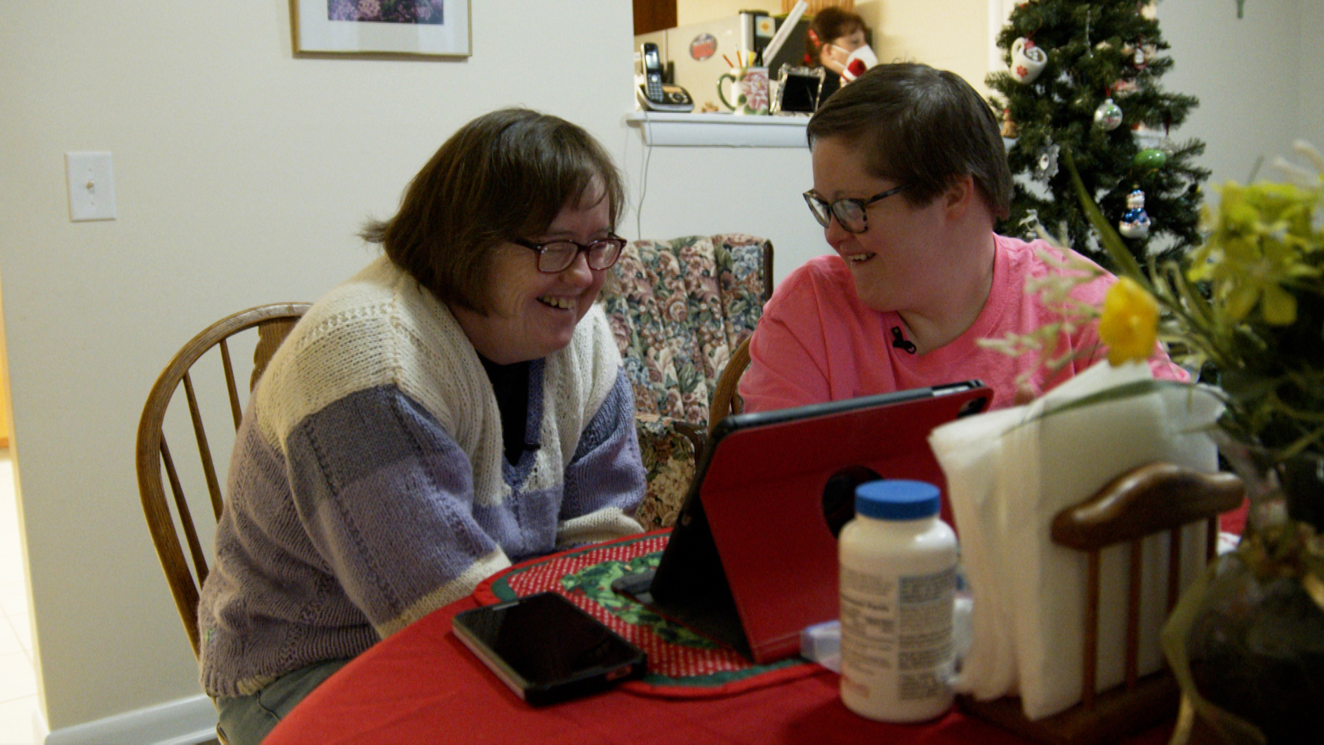 Roommates Amy and Katie plan their day. Credit: WXXI.